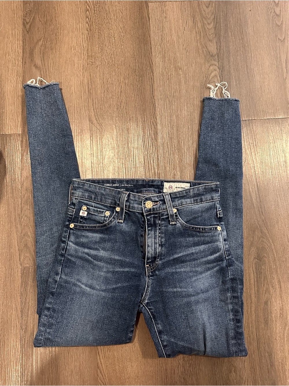 Ag Adriano Goldschmied Dark Wash mid rise Skinny Jeans